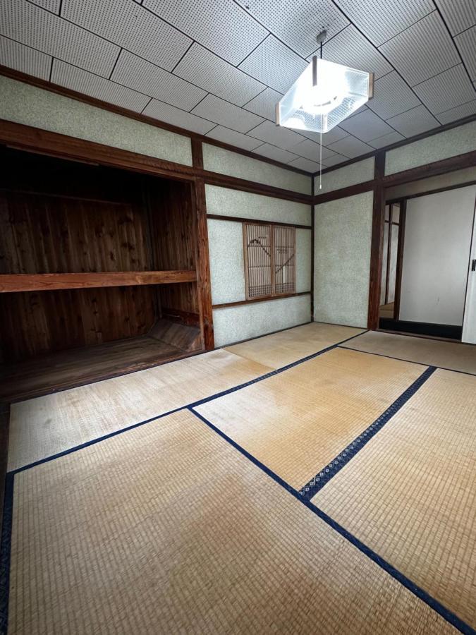素泊まり民宿とみや Oshima Exterior foto
